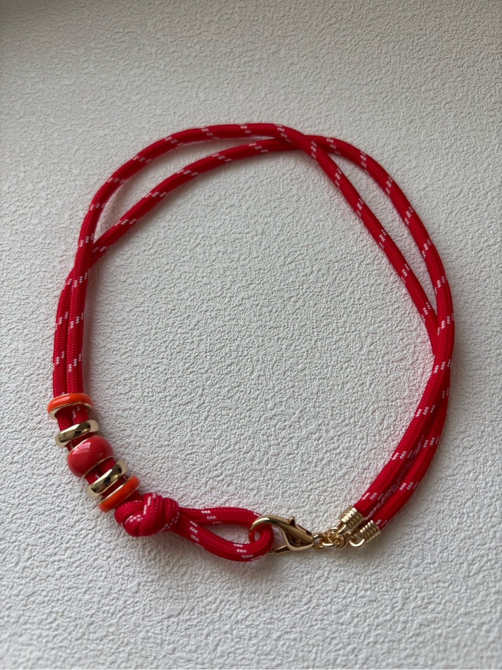 New Roxanne Assoulin Red  happy cord necklace